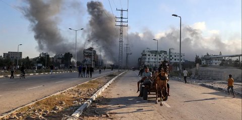 FOTO: Kejamnya Israel Bombardir Jalan yang Digunakan Warga Jalur Gaza ke Pusat Distribusi Bantuan